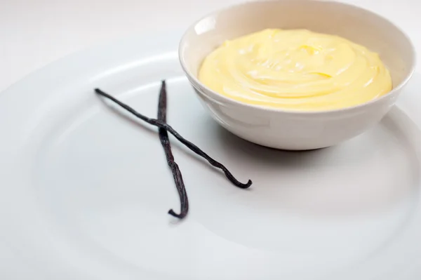 Vanilla custard pastry cream with seeds sticks