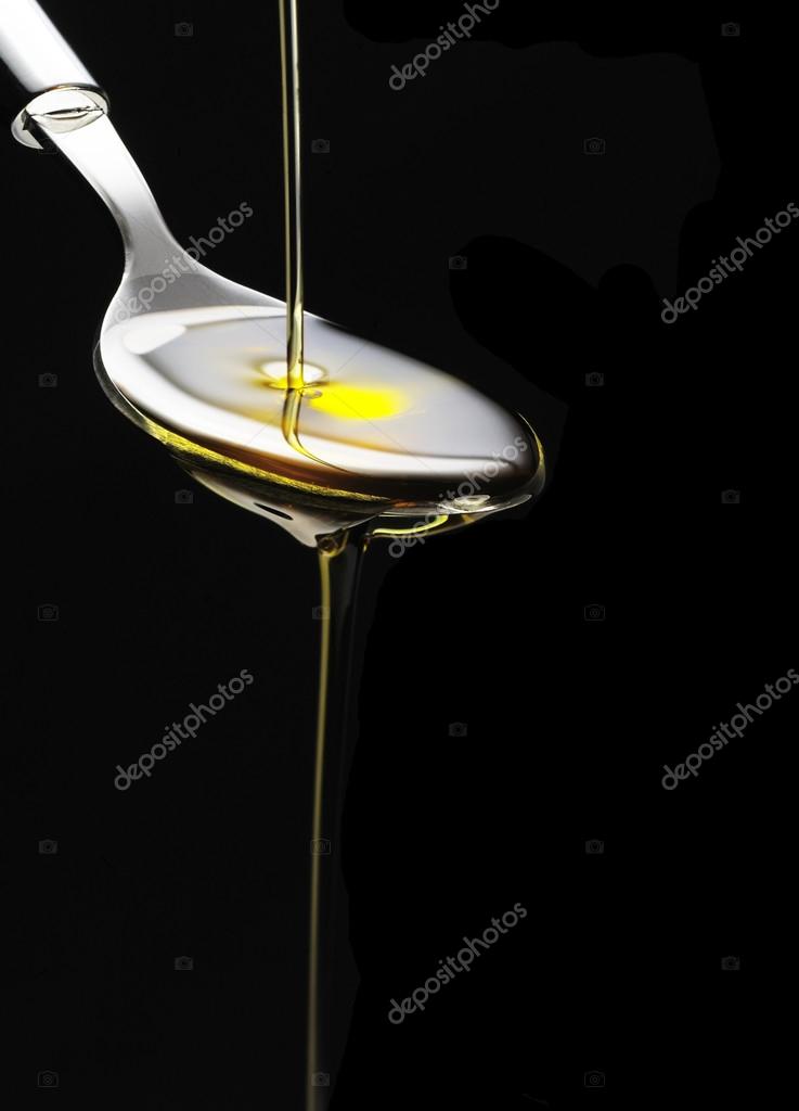 Une cuillère d'huile d'olive — Photo #34391733