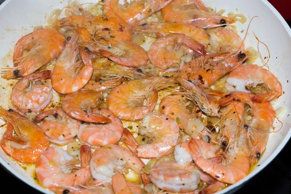 Fresh gulf shrimps with garlic fried in olive oil