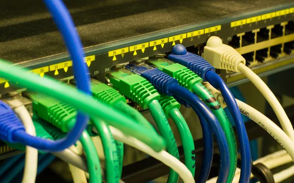 UTP Network cables connected to an Fast-Giga ethernet ports