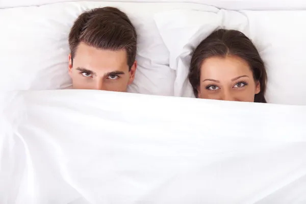 Funny couple in bed