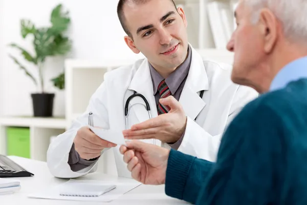 Doctor giving a prescription
