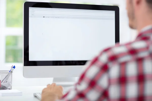 Young man  using computer