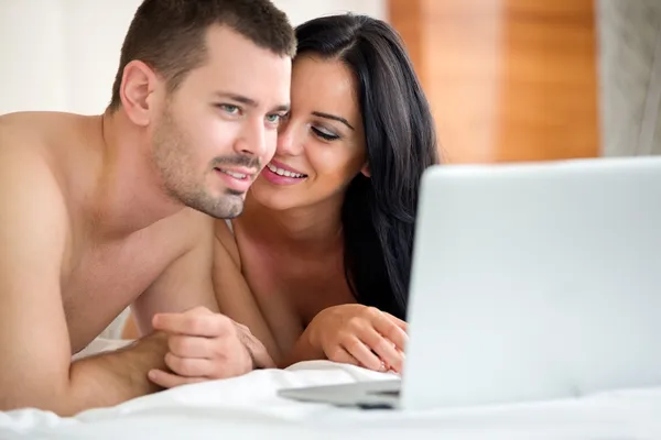 Couple watching porn movie