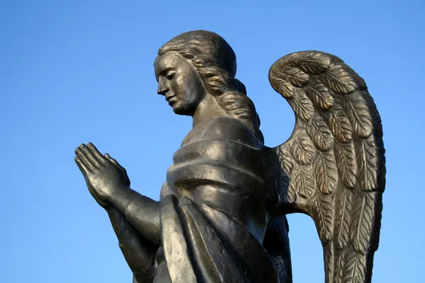 Fragment of a bronze sculpture of a praying angel 6