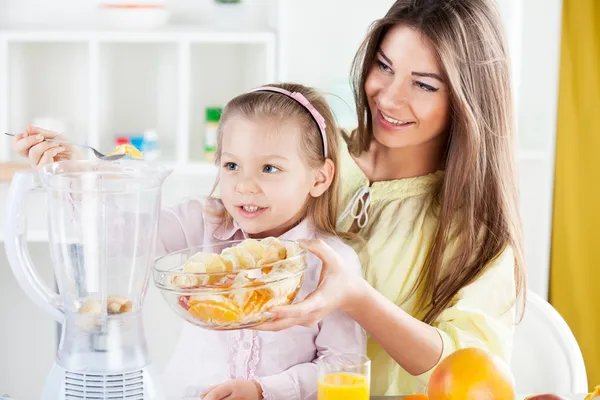 Mother and daughter in the kitchen