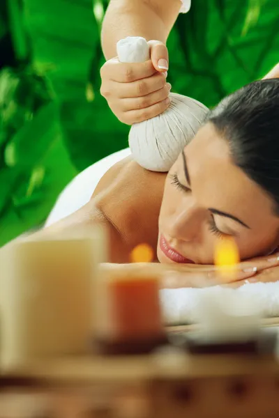 Portrait of young beautiful woman in spa environment