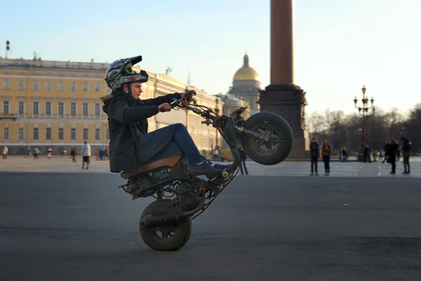 The guy on the scooter on Palace Square