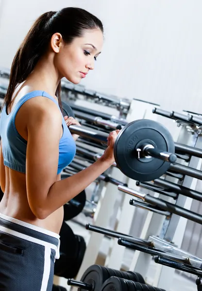 Woman with dumbbells