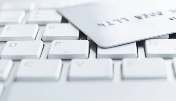 Close up shot of credit card on a computer keyboard