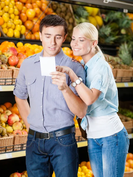 Couple with shopping list