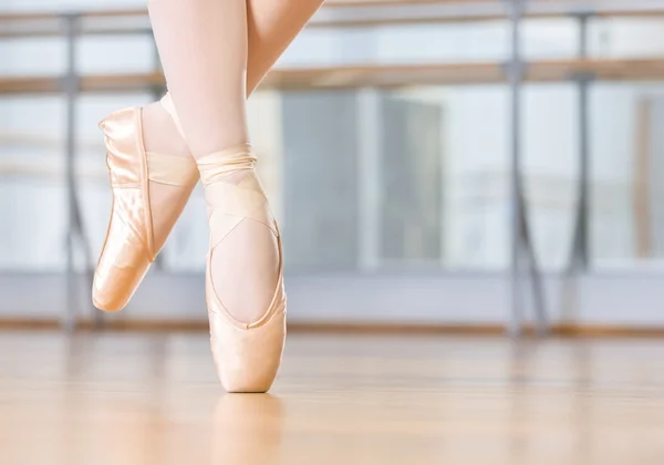 Closeup of dancing legs of ballerina in pointes