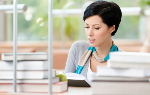 Woman studies at the reading hall