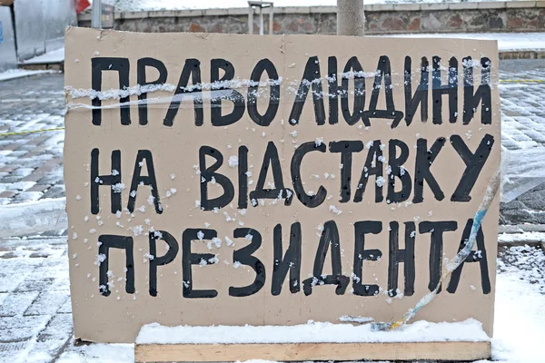 Human rights for president resignation, poster on ukrainian, Euro maidan meeting, Kiev .
