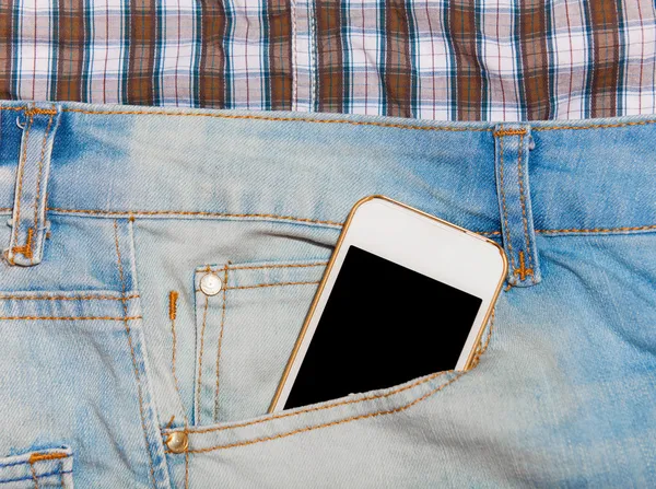 Mobile phone in jeans pocket