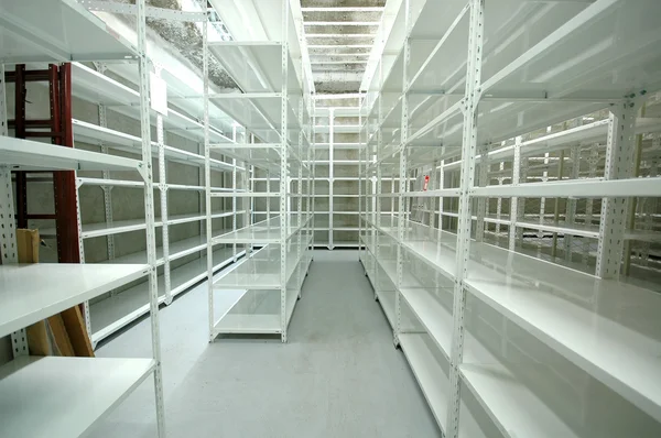 Empty warehouse, storage racks