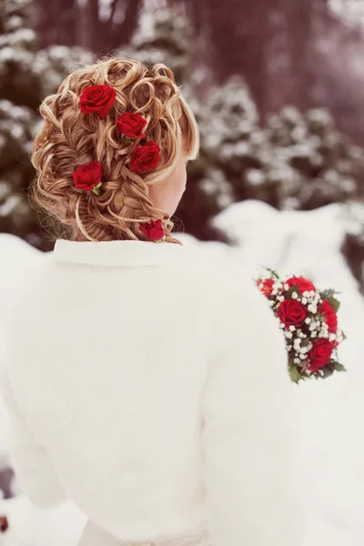 Bride hairstyle with red roses