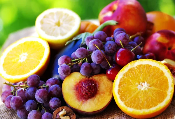 Slices of peach, grapes and citrus fruits