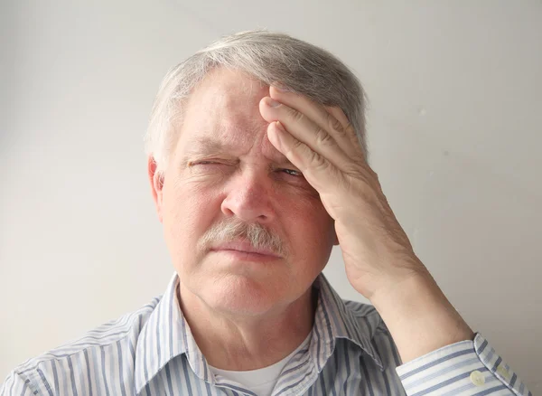 Older man with head pain