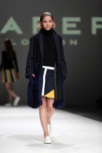 Fashion model wearing clothes designed by Paper London on the Zagreb Fashion Week on May 09, 2014 in Zagreb, Croatia