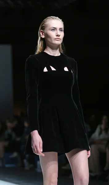 Fashion model wearing clothes designed by Paper London on the Zagreb Fashion Week on May 09, 2014 in Zagreb, Croatia