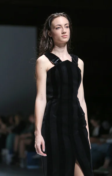 Fashion model wearing clothes designed by Paper London on the Zagreb Fashion Week on May 09, 2014 in Zagreb, Croatia