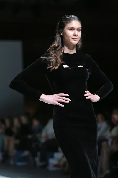 Fashion model wearing clothes designed by Paper London on the Zagreb Fashion Week on May 09, 2014 in Zagreb, Croatia