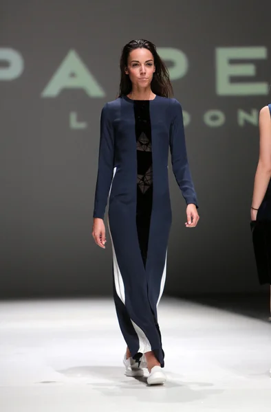 Fashion model wearing clothes designed by Paper London on the Zagreb Fashion Week on May 09, 2014 in Zagreb, Croatia