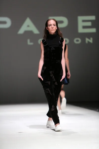 Fashion model wearing clothes designed by Paper London on the Zagreb Fashion Week on May 09, 2014 in Zagreb, Croatia