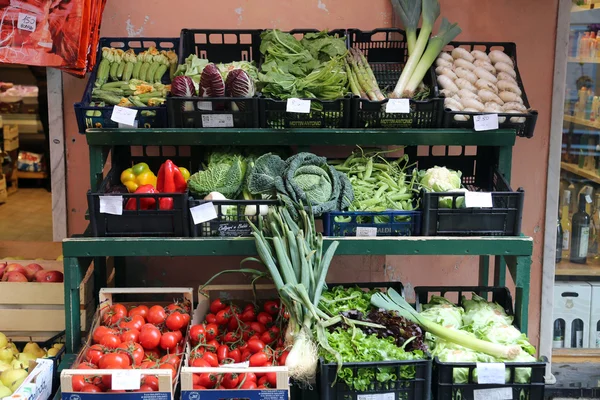 Typical Italian grocery store on village street in Riomaggiore, Cinque Terre, Italy