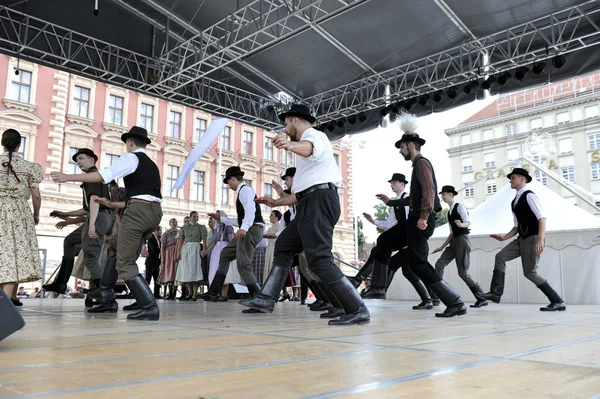 Members of folk groups Nograd from Salgotarjan, Hungary during the 48th International Folklore Festival in center of Zagreb, Croatia on July 19, 2014