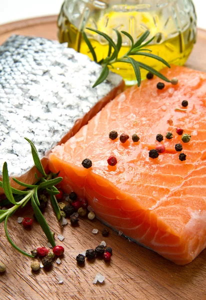 Fresh salmon fillet on wooden board