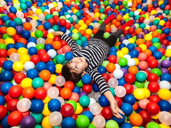 Boy playing with balls