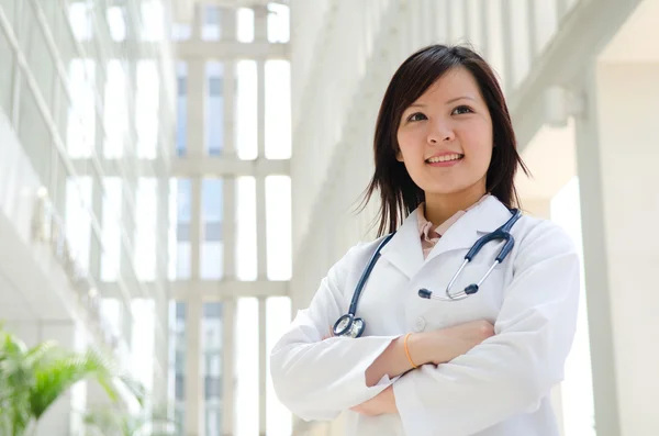 Southeast Asian medical student. Young medical doctor woman stan