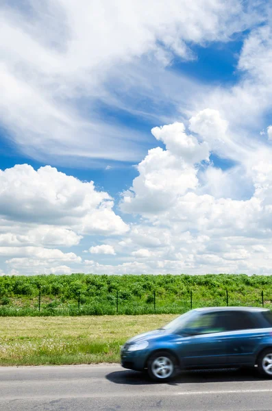 The car on a background of clouds