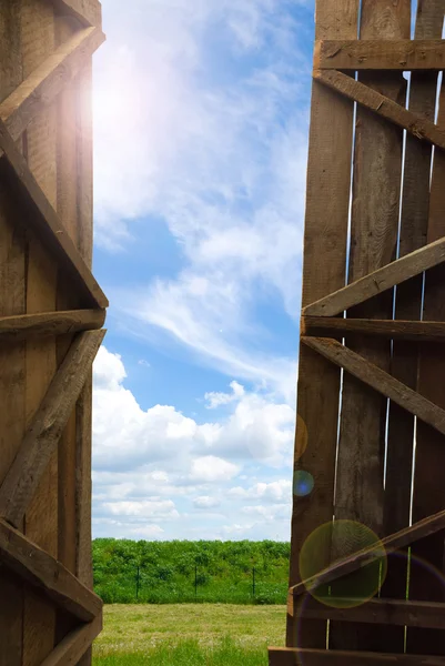 An open gate of a barn