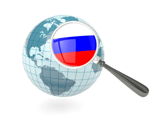 俄罗斯与蓝色地球放大的国旗 - 图库照片Mishc