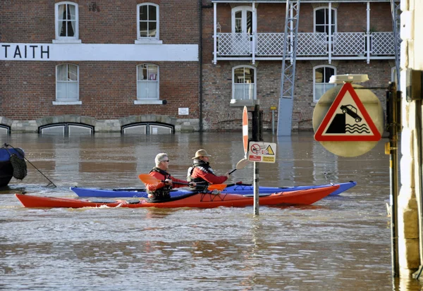 Canoeists on flooded River Ouse
