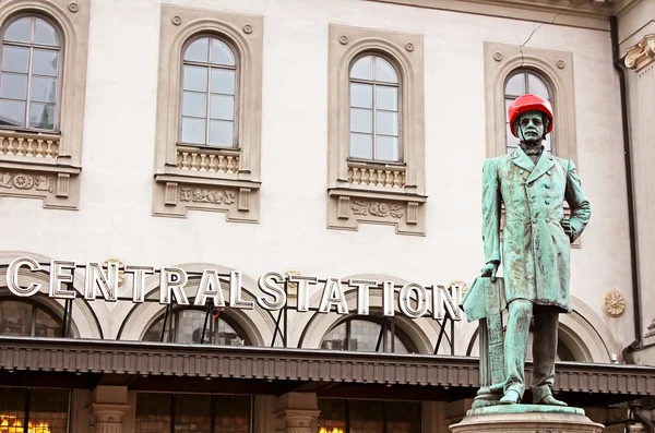 Satue of Nils Ericson in front of Central station in Stockholm with red hard hat on its head during reconstruction in Stockholm, Sweden