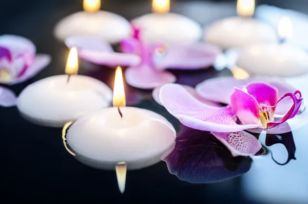 Floating candle and orchid flower, SPA