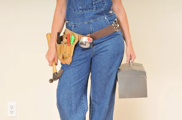 Woman in Overalls withTool Box