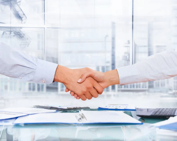 Business people shaking hands