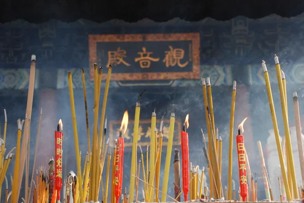 Incense Sticks Burning in Chinese Temple