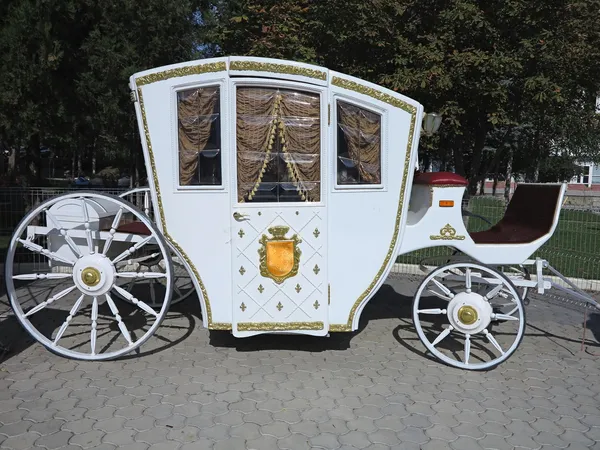 Vintage white luxury royal wedding carriage