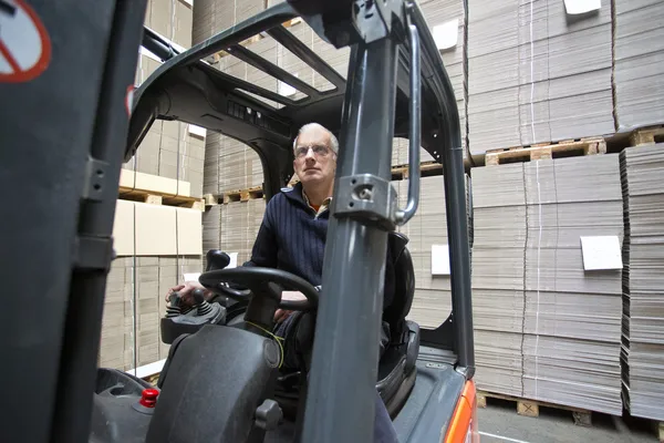 Forklift driver inside forklif