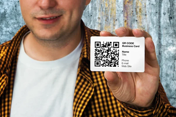 Construction worker with QR code business card