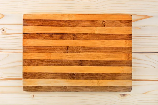 Worn butcher block cutting and chopping board as background