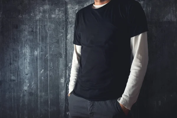 Man in blank black t-shirt