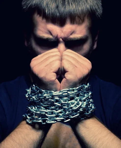 Chained man