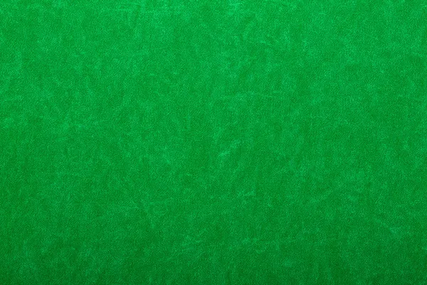 Green felt on casino table